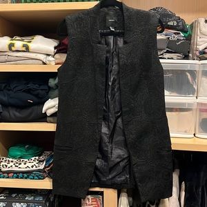 Sleeveless long vest